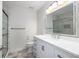 Bright bathroom features hexagonal floor tiles, glass shower and white vanity at 1116 Sea Island Crossing Ln, Mount Pleasant, SC 29464