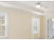 Bright bedroom with tray ceiling, neutral walls, and lots of natural light at 1116 Sea Island Crossing Ln, Mount Pleasant, SC 29464