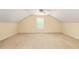 Large bonus room with carpet and a window offering ample natural light at 1116 Sea Island Crossing Ln, Mount Pleasant, SC 29464
