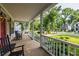 Relaxing front porch with rocking chairs and peaceful neighborhood view at 1116 Sea Island Crossing Ln, Mount Pleasant, SC 29464