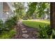 Serene view of the home's exterior and meticulously maintained front yard at 1116 Sea Island Crossing Ln, Mount Pleasant, SC 29464