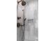 Spa-like shower features dual shower heads, niche, and marble style tile at 1116 Sea Island Crossing Ln, Mount Pleasant, SC 29464