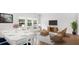 Spacious, open-concept living and dining area filled with natural light and tasteful decorations at 116 Lefton Lndg, Summerville, SC 29485