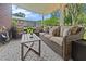 Inviting covered patio with comfortable seating and decorative outdoor rug at 116 Lyle Rd, Goose Creek, SC 29445
