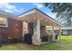Charming backyard with a covered patio and string lights at 116 Lyle Rd, Goose Creek, SC 29445