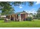 View of the backyard with a covered patio, perfect for outdoor living at 116 Lyle Rd, Goose Creek, SC 29445