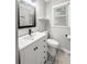 Bright bathroom with a modern vanity, patterned tile flooring and a glass enclosed shower at 116 Lyle Rd, Goose Creek, SC 29445