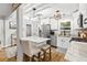 Open kitchen with granite countertops and island seating at 116 Lyle Rd, Goose Creek, SC 29445