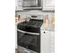 Stainless steel kitchen range with granite countertops and white cabinets at 116 Lyle Rd, Goose Creek, SC 29445