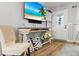 Cozy living room featuring stylish decor, wood floors, and a view of the front door at 116 Lyle Rd, Goose Creek, SC 29445