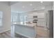 Open kitchen featuring a center island, stainless steel appliances, and ample cabinet space at 117 Oyster Tide Ave, Summerville, SC 29485
