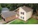 Aerial view of a neat two-story home featuring a brick-facade garage and a pristine, green lawn at 119 Scottswood Dr, North Charleston, SC 29418