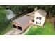 Aerial view of a two-story home with a two-car garage, complemented by a well-manicured lawn at 119 Scottswood Dr, North Charleston, SC 29418