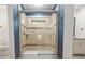 Bathroom features a glass-enclosed shower, tiled walls, and granite countertops at 119 Scottswood Dr, North Charleston, SC 29418