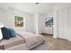 Inviting bedroom with a queen-size bed, closet and a window that overlooks the surrounding nature at 119 Scottswood Dr, North Charleston, SC 29418