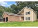 Inviting two-story home with brick accents, a two-car garage, and manicured front lawn at 119 Scottswood Dr, North Charleston, SC 29418