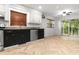 Modern kitchen features stainless steel appliances and a sliding door to the backyard at 119 Scottswood Dr, North Charleston, SC 29418
