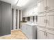 Laundry room featuring modern washer and dryer, with lots of extra cabinet space at 119 Scottswood Dr, North Charleston, SC 29418
