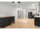 Open floorplan featuring modern kitchen and hardwood floors at 119 Scottswood Dr, North Charleston, SC 29418