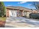 Charming brick home with a single-car garage and well-maintained landscaping at 127 Manning Ct, Summerville, SC 29485