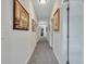 Long hallway featuring neutral walls, modern lighting, carpet floors and framed pictures at 127 Manning Ct, Summerville, SC 29485