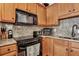 Updated kitchen cabinets, countertop, and backsplash at 127 Manning Ct, Summerville, SC 29485