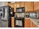 Updated kitchen cabinets, countertop, and stainless steel appliances at 127 Manning Ct, Summerville, SC 29485