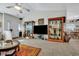 Bright living room with carpet floors, high ceilings, and modern decor at 127 Manning Ct, Summerville, SC 29485