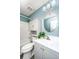 Updated bathroom featuring a vanity, round mirror, toilet, and shower-tub combination at 129 Dovetail Cir, Summerville, SC 29483