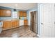Well-lit kitchen with stainless steel appliances, wooden cabinets, and neutral countertops at 129 Dovetail Cir, Summerville, SC 29483