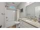 Bright bathroom featuring a vanity with granite countertop, and shower over tub at 1338 Addykay Pl, North Charleston, SC 29406