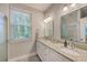 Elegant bathroom with double vanity, granite countertops, and modern fixtures at 1338 Addykay Pl, North Charleston, SC 29406