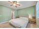 Comfortable bedroom with ceiling fan, neutral decor, and ample natural light at 1338 Addykay Pl, North Charleston, SC 29406