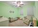 Bright bedroom features a comfortable chair and cozy play area at 1338 Addykay Pl, North Charleston, SC 29406