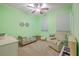 Bright bedroom features a comfortable chair and cozy play area at 1338 Addykay Pl, North Charleston, SC 29406