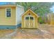 A sturdy shed in a fenced in backyard provides practical outdoor storage at 1338 Addykay Pl, North Charleston, SC 29406
