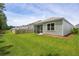 Well-maintained backyard with screened porch, complemented by a wood fence and ample green space at 139 Sunray Ln, Summerville, SC 29486