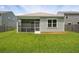 Home exterior featuring an outdoor screened-in patio at 139 Sunray Ln, Summerville, SC 29486