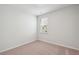 Neutral carpeted bedroom with white trim and natural light at 139 Sunray Ln, Summerville, SC 29486