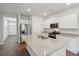 Bright kitchen with granite countertops, stainless steel appliances, and a large center island at 139 Sunray Ln, Summerville, SC 29486