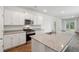 Bright kitchen features granite countertops, stainless steel appliances, and ample cabinet space at 139 Sunray Ln, Summerville, SC 29486