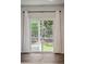 Sliding glass doors provide abundant natural light and access to the outdoor patio and yard at 139 Sunray Ln, Summerville, SC 29486