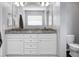 Updated bathroom featuring double vanity, granite countertop and modern fixtures at 1422 Iroquois St, North Charleston, SC 29405