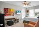 Bedroom with desk, TV, ceiling fan and wall decor at 1422 Iroquois St, North Charleston, SC 29405