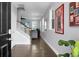 Elegant entryway showcasing hardwood floors, staircase, and stylish decor, creating a welcoming ambiance at 1422 Iroquois St, North Charleston, SC 29405