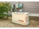 View of the Generac home generator, and utility connections in the backyard at 1422 Iroquois St, North Charleston, SC 29405