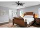 Bright primary bedroom with a bed, ceiling fan, and ensuite bathroom access at 1422 Iroquois St, North Charleston, SC 29405