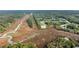 Aerial view of beautiful homes surrounded by scenic waterways and trees at 160 Palm Cove Way, Mount Pleasant, SC 29466