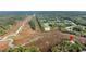 Stunning aerial view of a home nestled beside a scenic marsh and a lush community at 160 Palm Cove Way, Mount Pleasant, SC 29466