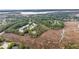 Scenic aerial view of waterfront homes surrounded by lush greenery at 160 Palm Cove Way, Mount Pleasant, SC 29466